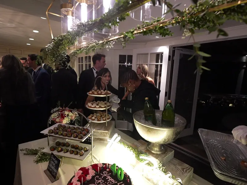 Tiered appetizer and dessert display with chilled champagne at a Livermore winery reception