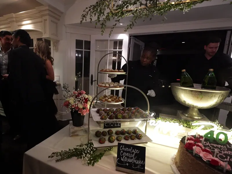 Tiered dessert stands and a milestone birthday cake at a Castro Valley party